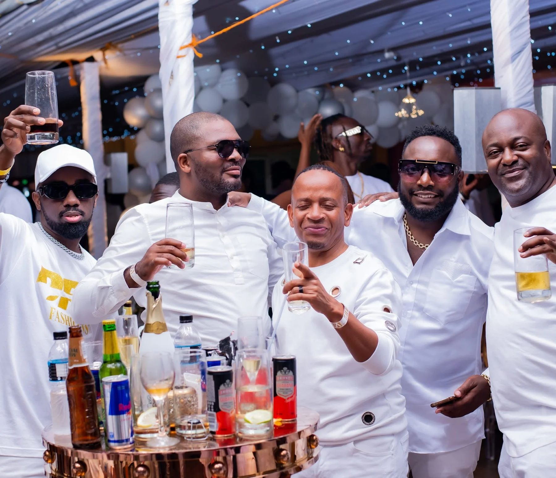Guests enjoying an elegant white party